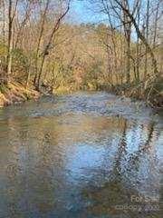 1852 Okeewemee Road Troy, NC 27371 - Photo 16 of 31 a view of outdoor space and a yard