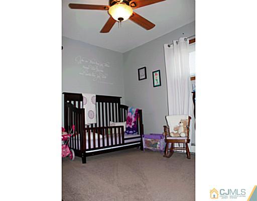 8 Colton Road Edison, NJ 08817 - Photo 11 of 19 a room with furniture and white walls