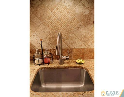 8 Colton Road Edison, NJ 08817 - Photo 8 of 19 a bathroom with a sink