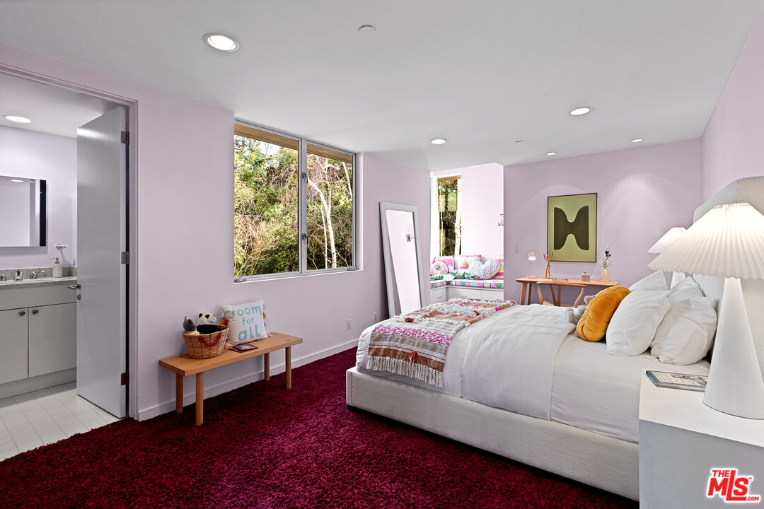 3114 Streamview Lane Studio City, CA 91604 - Photo 22 of 75 a bedroom with a bed and a couch