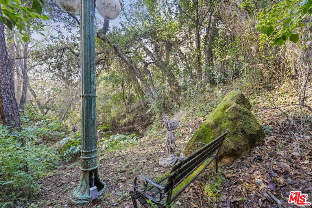 3114 Streamview Lane Studio City, CA 91604 - Photo 59 of 75 a backyard of a house with lots of green space