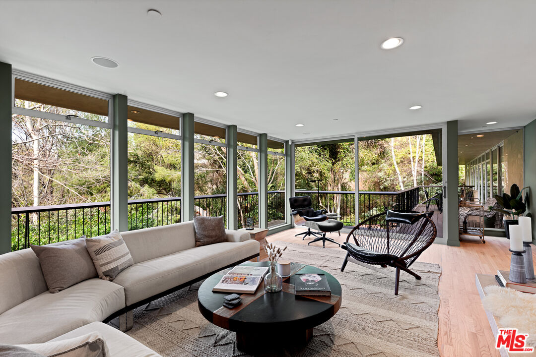 3114 Streamview Lane Studio City, CA 91604 - Photo 6 of 75 a living room with furniture and a large window
