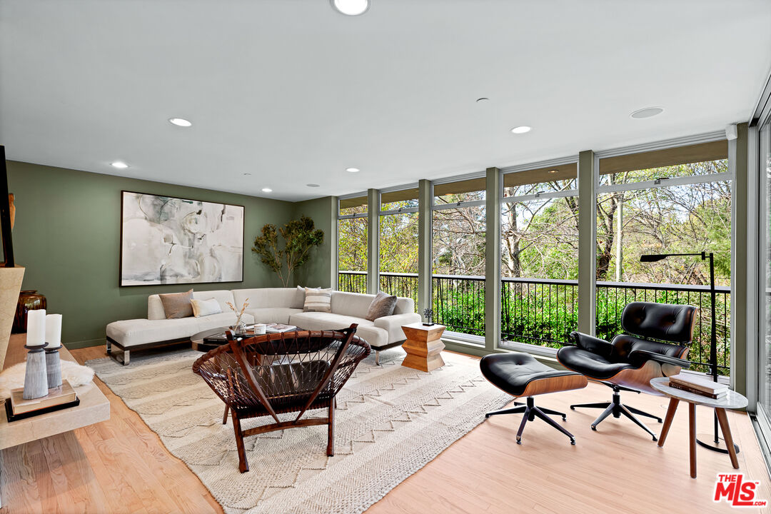 3114 Streamview Lane Studio City, CA 91604 - Photo 7 of 75 a living room with furniture and a large window