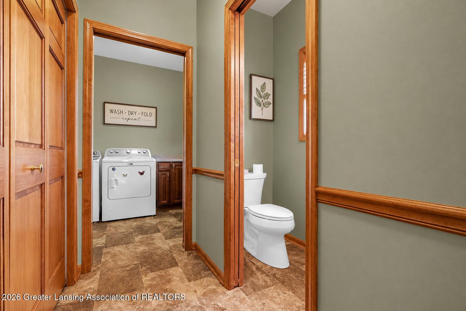 4580 Dimond Way Dimondale, MI 48821 - Photo 40 of 71 Laundry half bath Chat