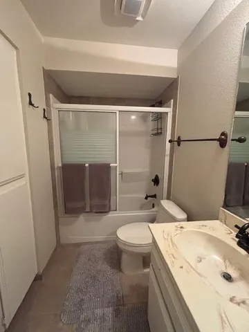 a bathroom with a sink and a toilet