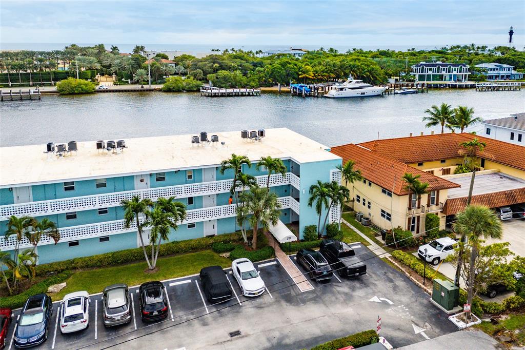 2758 Northeast 30th Avenue, Unit 3A Lighthouse Point, FL 33064 - Photo 17 of 25 an aerial view of a house with outdoor space and lake view