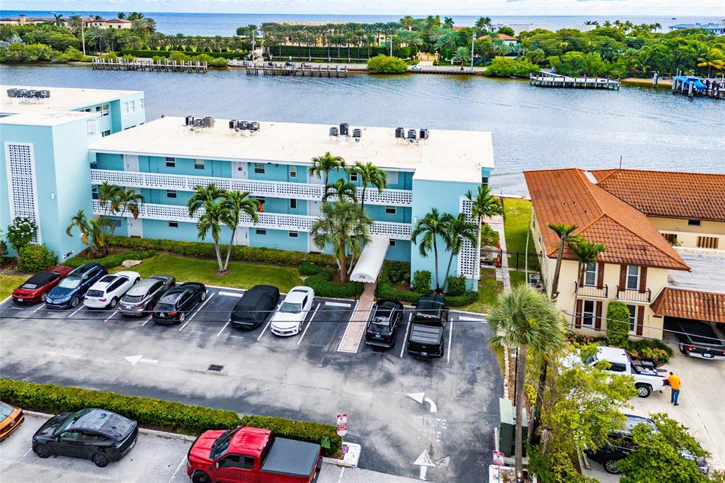 2758 Northeast 30th Avenue, Unit 3A Lighthouse Point, FL 33064 - Photo 18 of 25 an aerial view of a house with a lake view