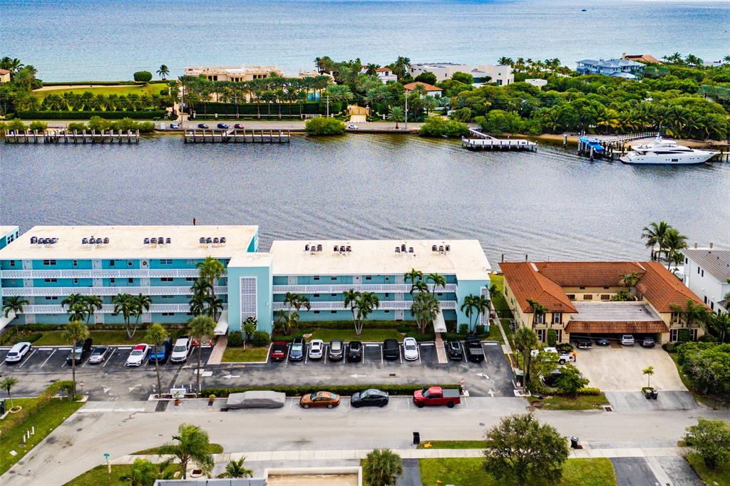 2758 Northeast 30th Avenue, Unit 3A Lighthouse Point, FL 33064 - Photo 19 of 25 an aerial view of a house with a lake view