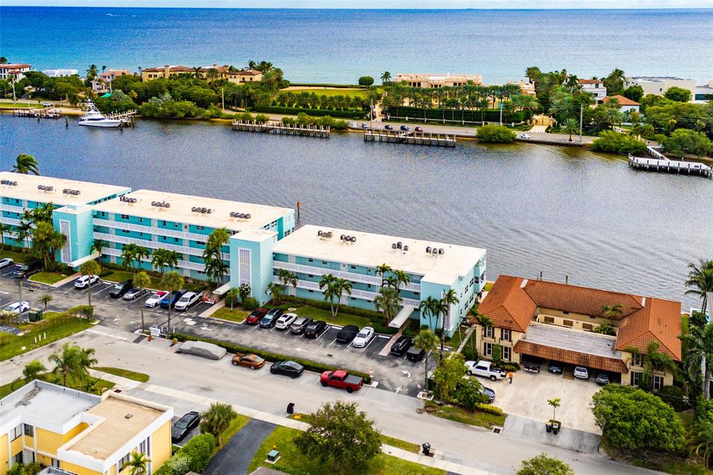 2758 Northeast 30th Avenue, Unit 3A Lighthouse Point, FL 33064 - Photo 20 of 25 an aerial view of a house with a lake view