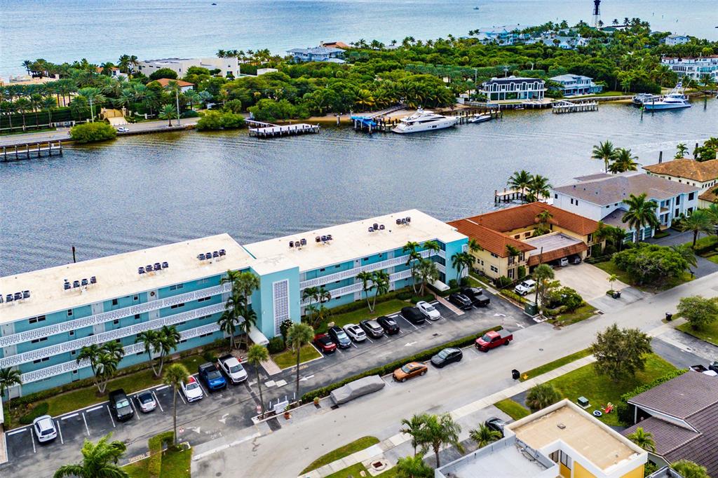 2758 Northeast 30th Avenue, Unit 3A Lighthouse Point, FL 33064 - Photo 2 of 25 an aerial view of a house with a lake view