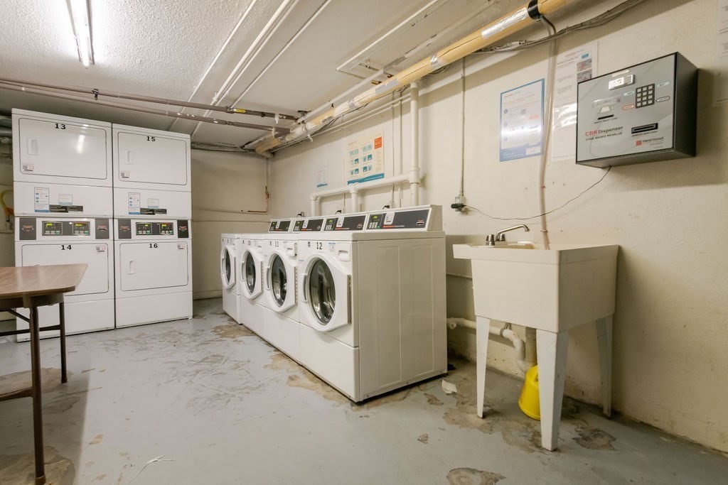 280 Corey Road, Unit 23 Boston, MA 02135 - Photo 15 of 19 a utility room with dryer and washer
