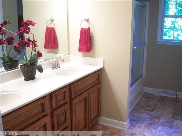 333 Barons Road Clemmons, NC 27012 - Photo 5 of 14 Other. hall bath,new cabinets,counter tops,faucets, vinyl floor and shower door