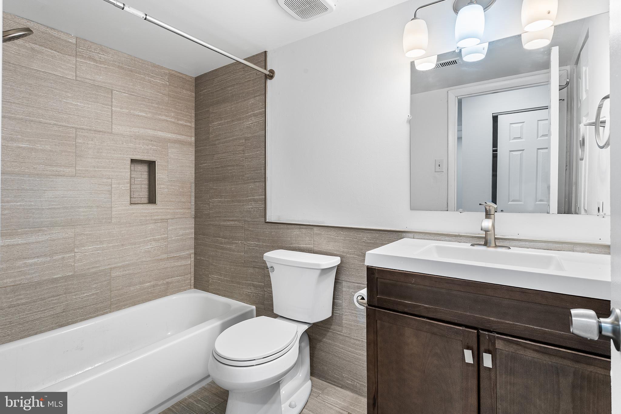 438 B Willow Turn Mount Laurel, NJ 08054 - Photo 15 of 27 a bathroom with a sink a toilet and shower