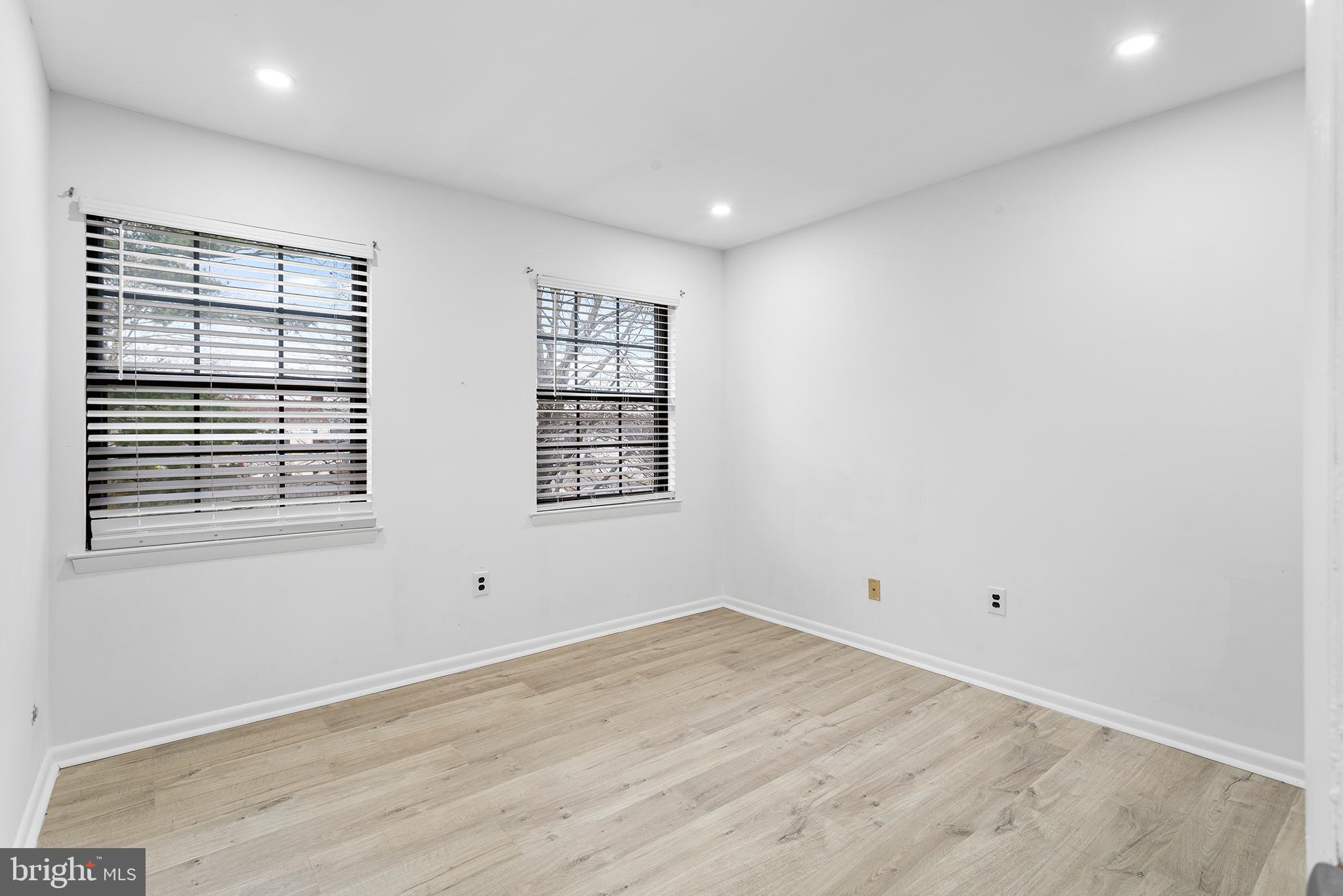 438 B Willow Turn Mount Laurel, NJ 08054 - Photo 19 of 27 an empty room with wooden floor and windows