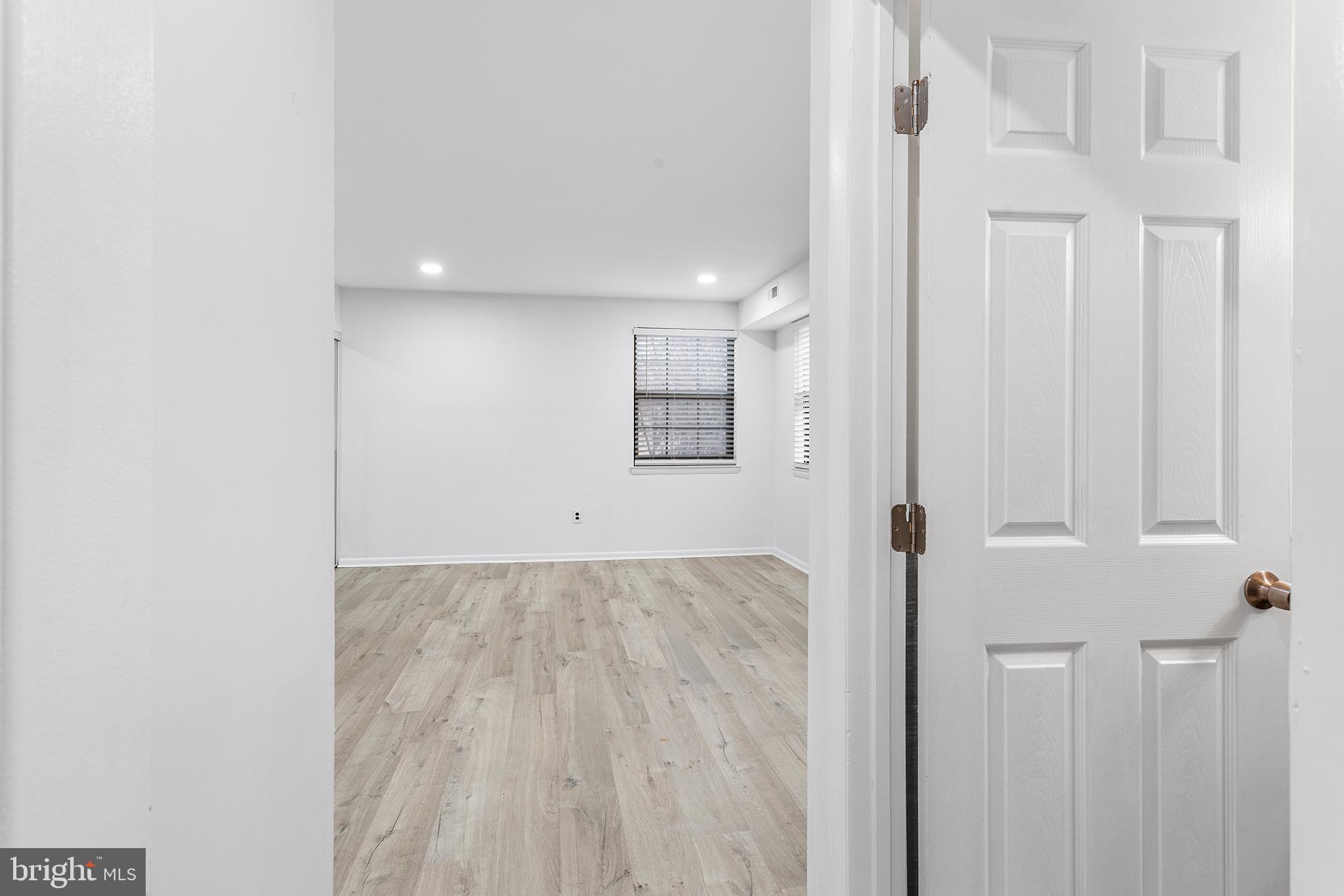 438 B Willow Turn Mount Laurel, NJ 08054 - Photo 21 of 27 a view of a hallway with wooden floor