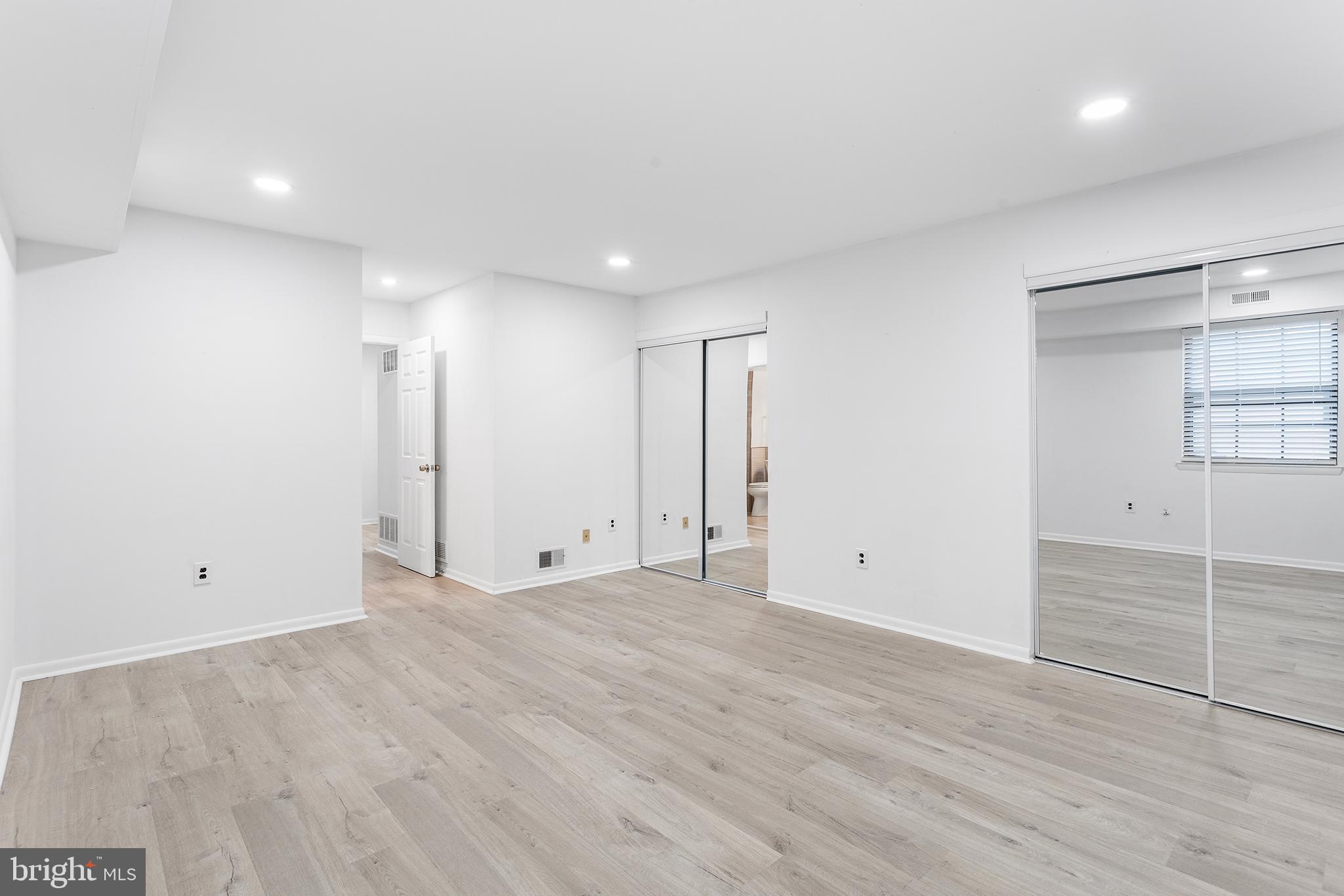 438 B Willow Turn Mount Laurel, NJ 08054 - Photo 24 of 27 wooden floor in an empty room with a window