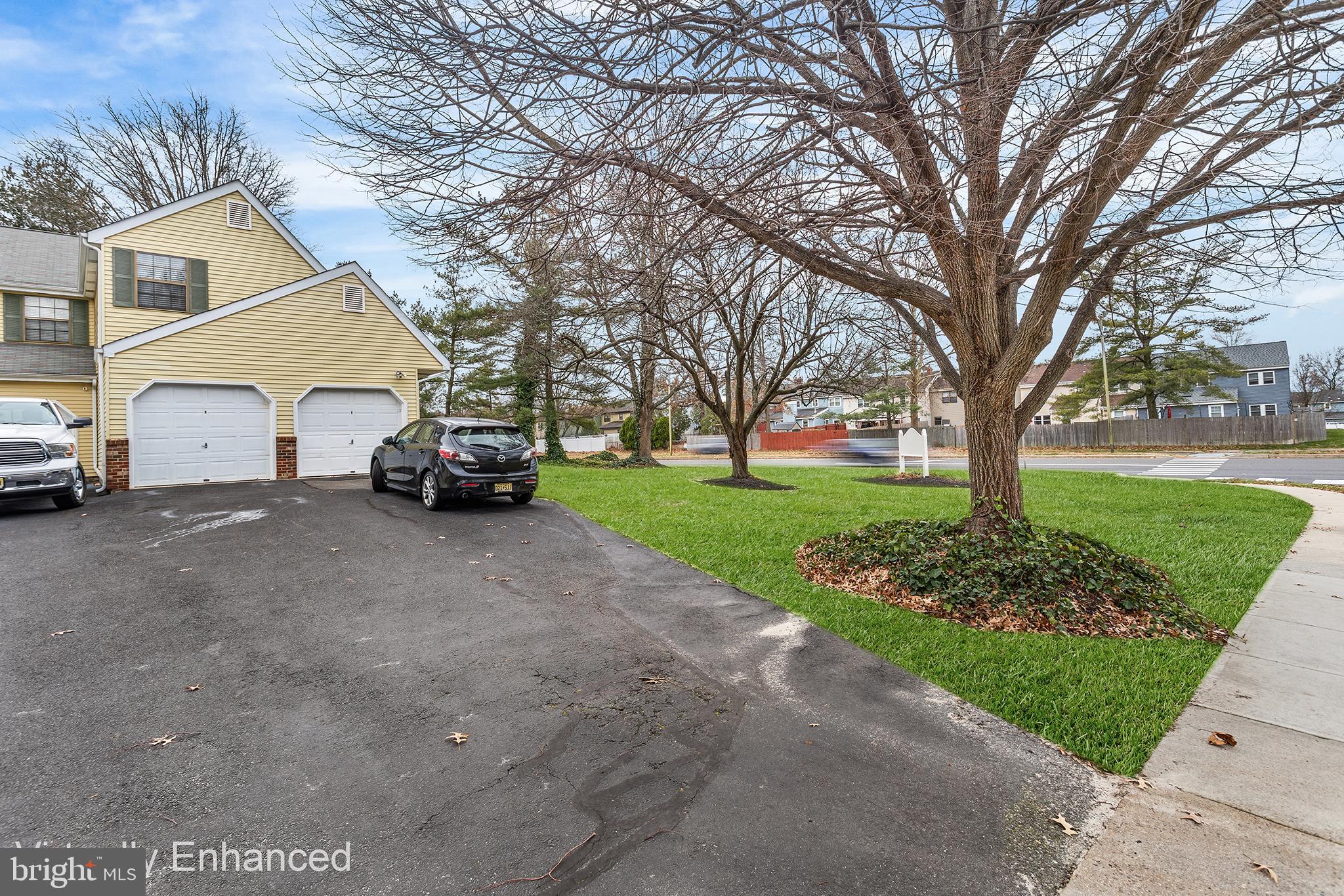 438 B Willow Turn Mount Laurel, NJ 08054 - Photo 4 of 27 a car parked in front of white house