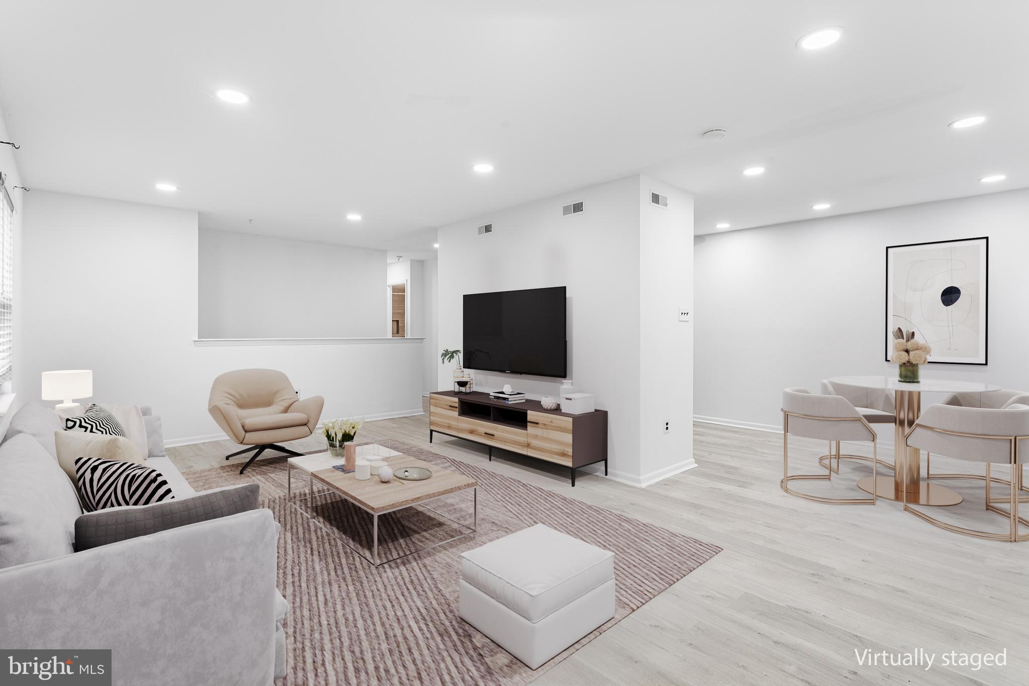 438 B Willow Turn Mount Laurel, NJ 08054 - Photo 8 of 27 a living room with furniture and a flat screen tv