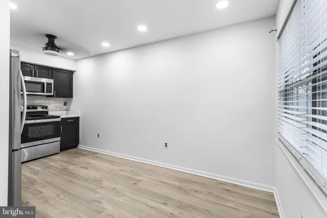 a view of kitchen and microwave