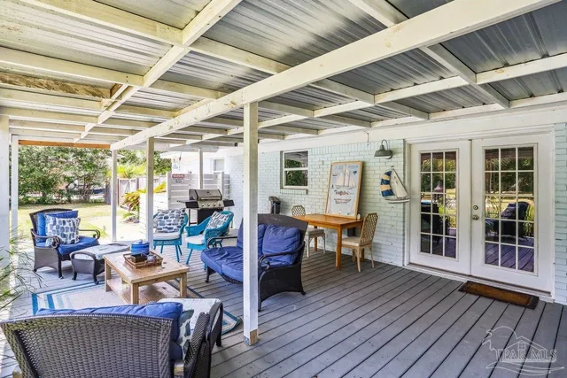 a view of a swimming pool with a patio