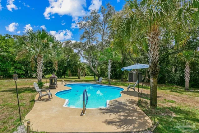 a view of a house with swimming pool