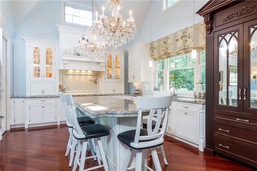 171 Eustis Avenue Newport, RI 02840 - Photo 19 of 39 Kitchen features custom Thermador refrigerator armoire, duel chandeliers and 19' ceilings