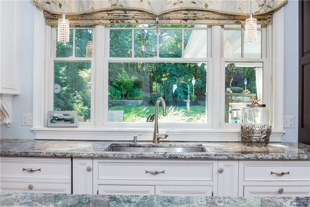 171 Eustis Avenue Newport, RI 02840 - Photo 22 of 39 The gourmet kitchen design was inspired by its wonderfully unique mother-of-pearl fish drawer pulls overlooking elaborate grounds