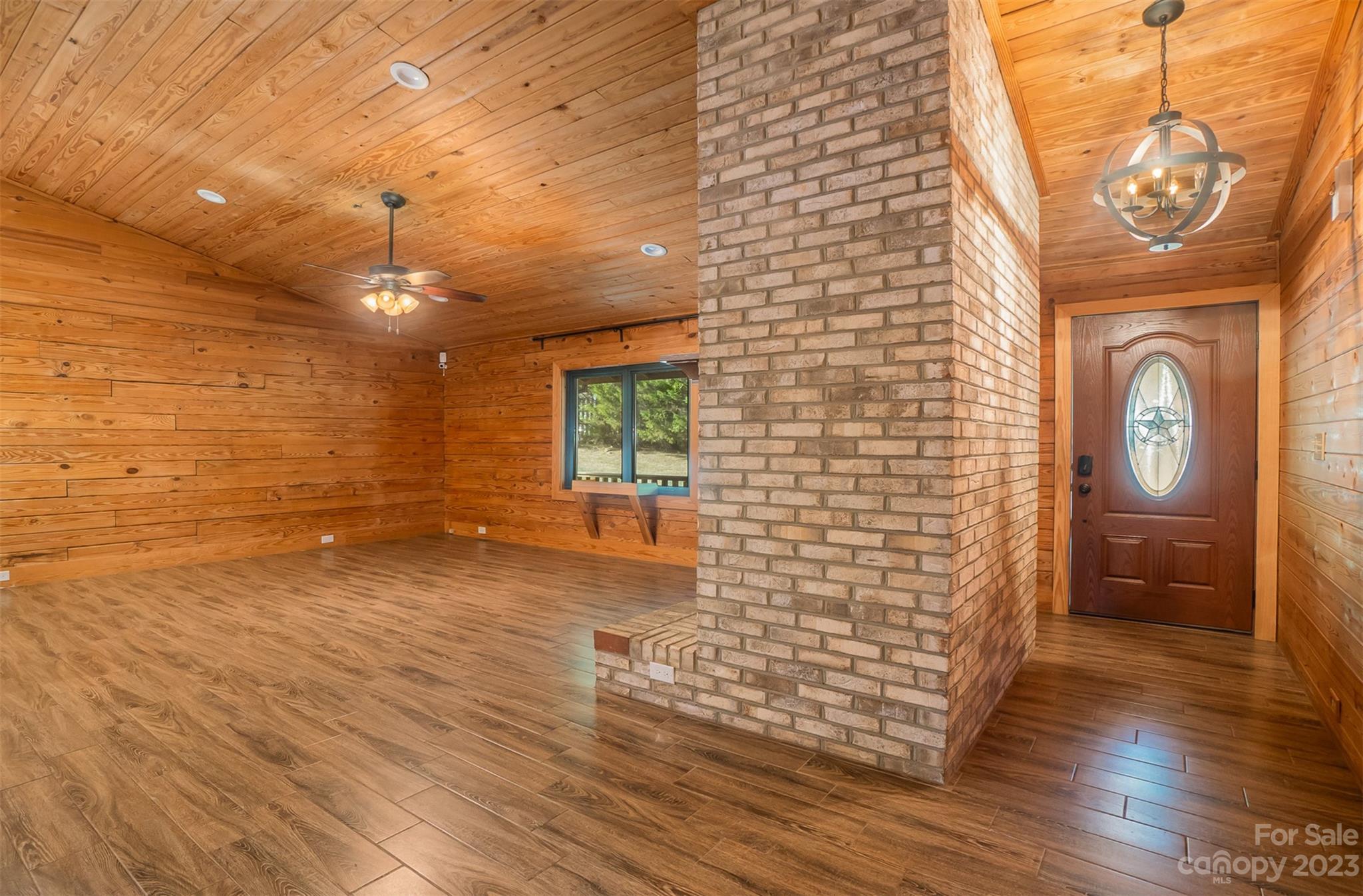 494 Graystone Road Rockwell, NC 28138 - Photo 14 of 36 a view of empty room with wooden floor