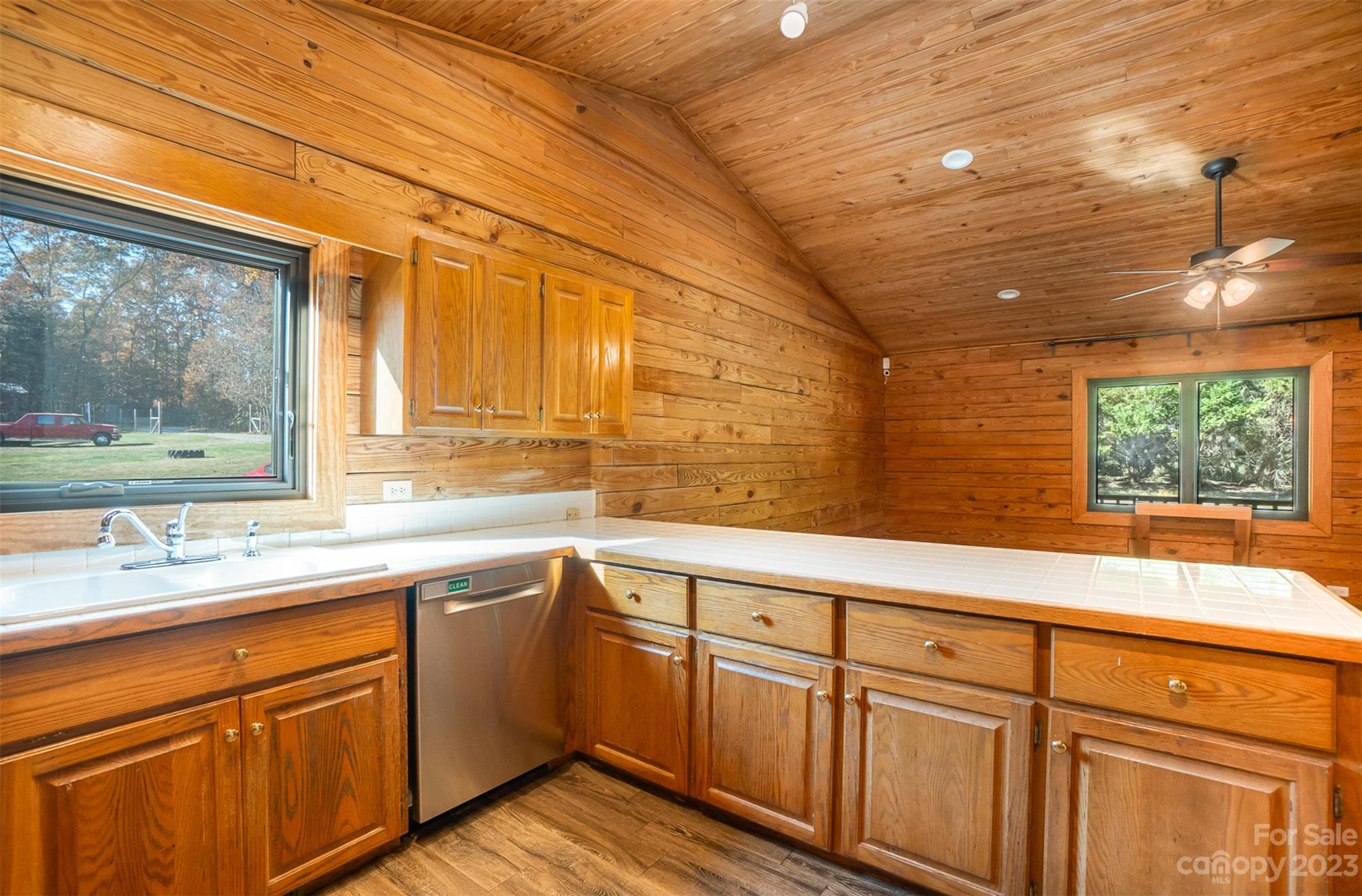 494 Graystone Road Rockwell, NC 28138 - Photo 18 of 36 a kitchen with cabinets and window