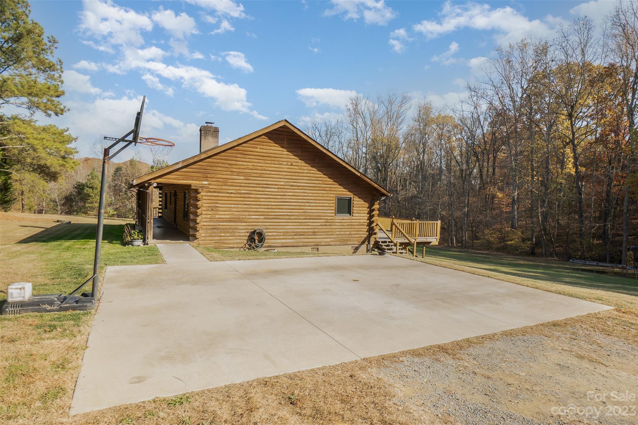 494 Graystone Road Rockwell, NC 28138 - Photo 34 of 36 a view of a house with backyard and trees