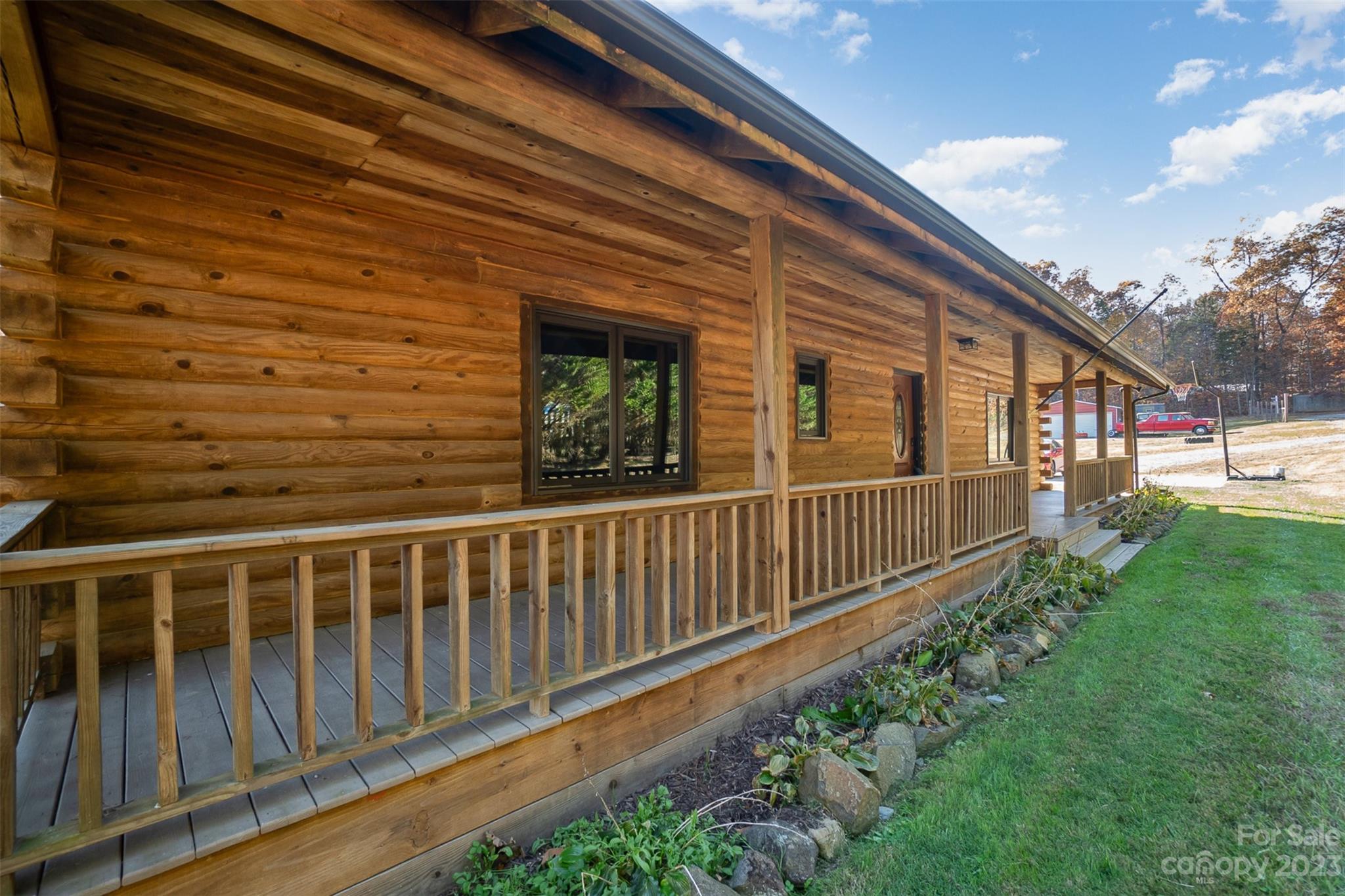 494 Graystone Road Rockwell, NC 28138 - Photo 4 of 36 a view of a house with backyard and porch