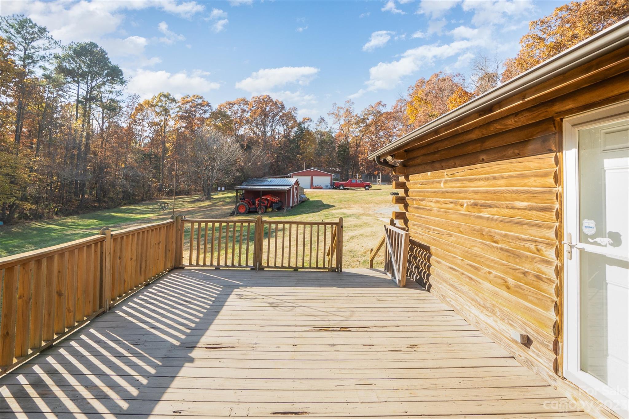 494 Graystone Road Rockwell, NC 28138 - Photo 6 of 36 a balcony with view of trees in the background