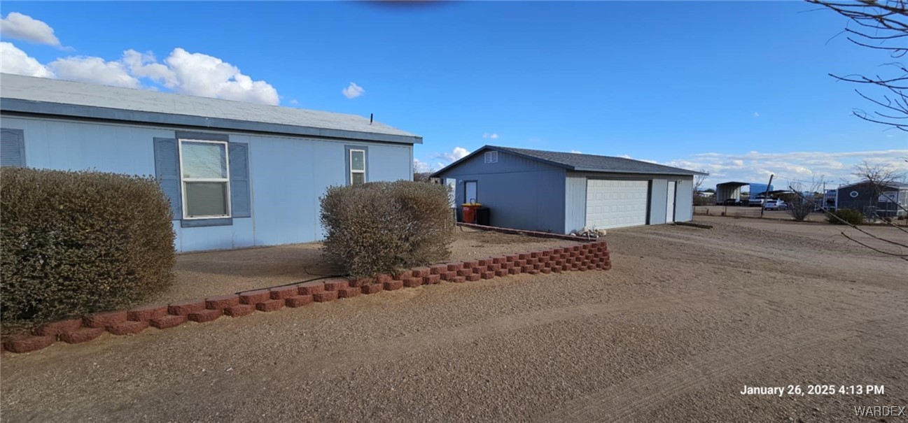 3746 Aguila Road Golden Valley, AZ 86413 - Photo 2 of 48 Side of Structure