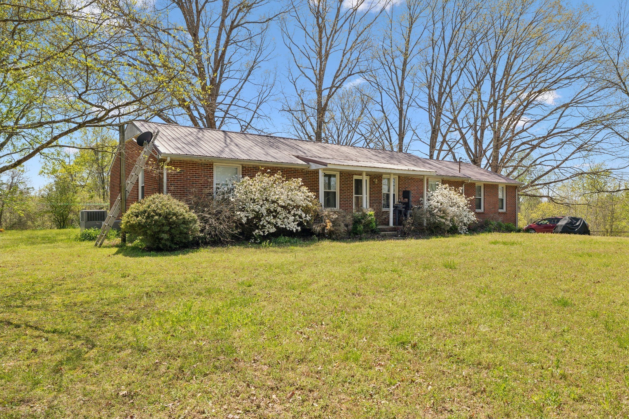 3467 Shouse Road Santa Fe, TN 38482 - Photo 12 of 55 a front view of a house with garden