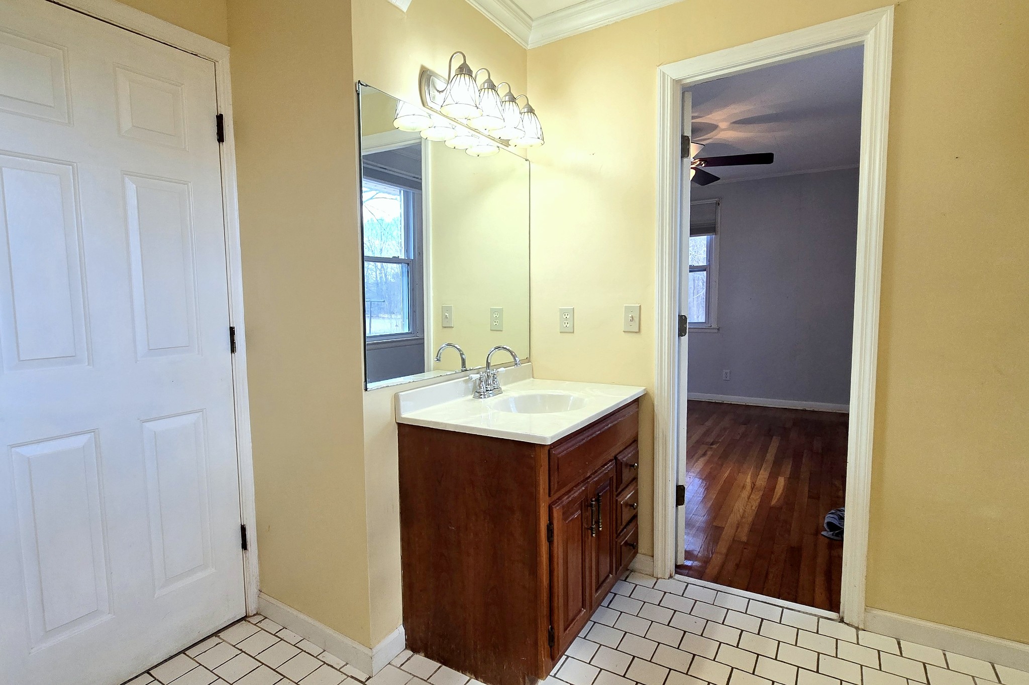 3467 Shouse Road Santa Fe, TN 38482 - Photo 31 of 55 a bathroom with a sink a mirror and a shower