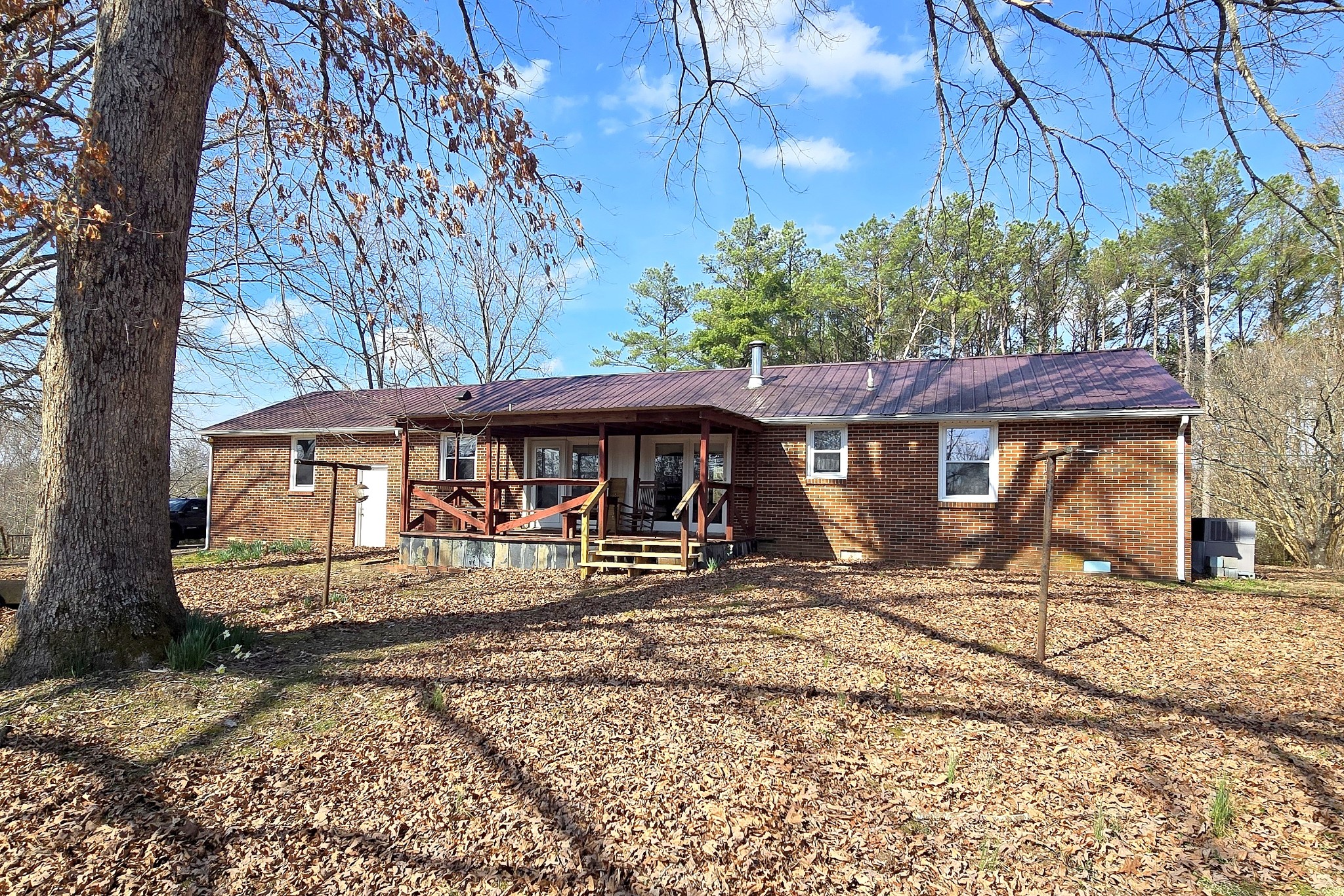 3467 Shouse Road Santa Fe, TN 38482 - Photo 33 of 55 a front view of a house with large garden
