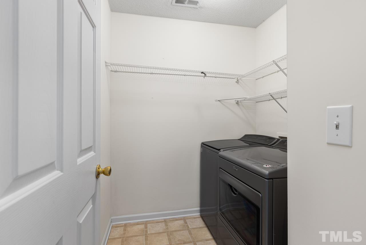 4808 Marathon Lane Raleigh, NC 27616 - Photo 15 of 31 a utility room with dryer and washer