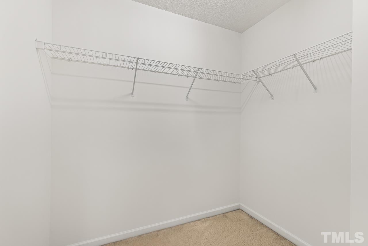 4808 Marathon Lane Raleigh, NC 27616 - Photo 23 of 31 a view of a room with racks on the wall
