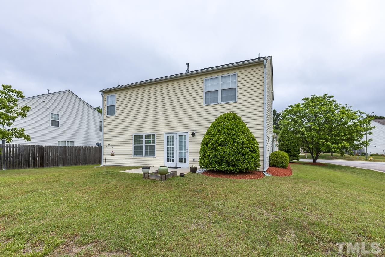 4808 Marathon Lane Raleigh, NC 27616 - Photo 29 of 31 a view of a house with a yard and plants