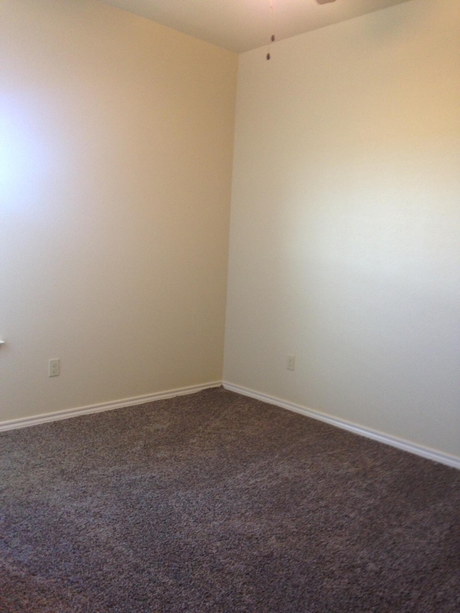 1212 Preston Trail, Unit A Wolfforth, TX 79382 - Photo 12 of 12 a view of an empty room