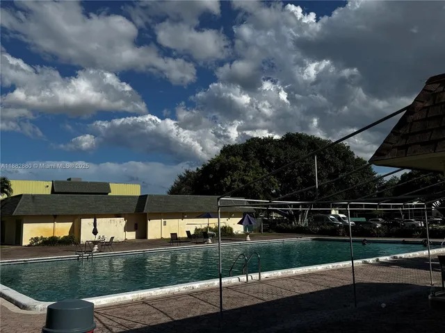 a view of backyard with deck