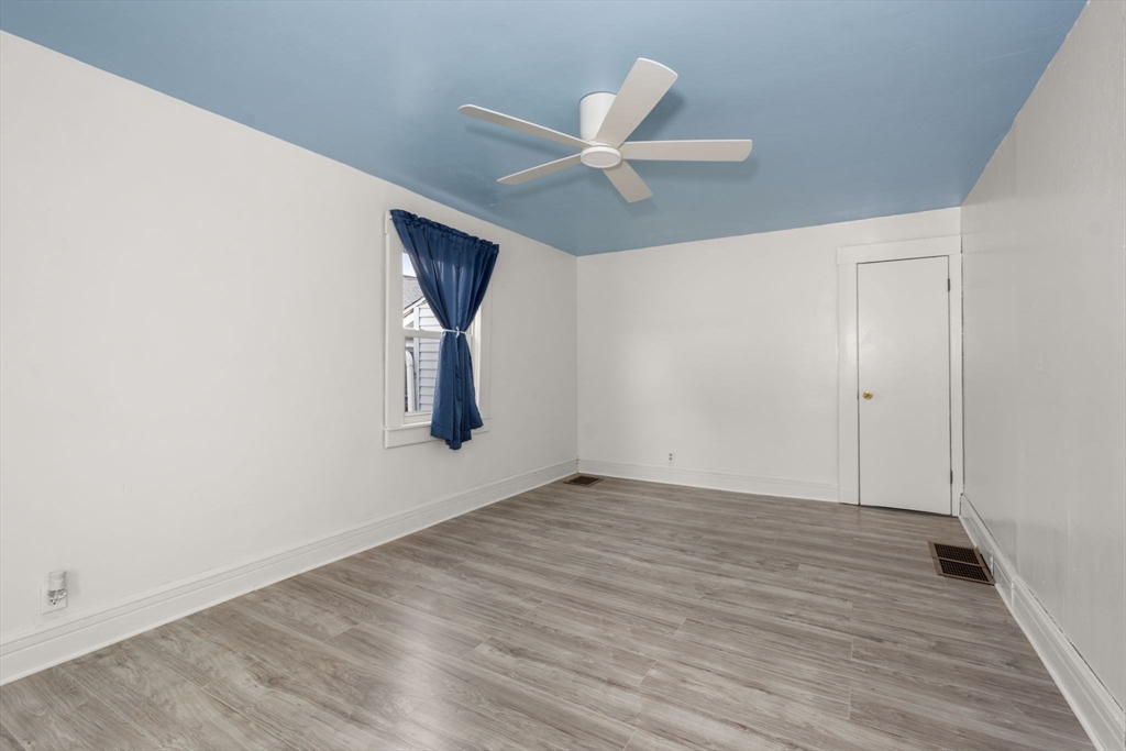 97 Mechanic Street Westfield, MA 01085 - Photo 23 of 40 wooden floor in an empty room