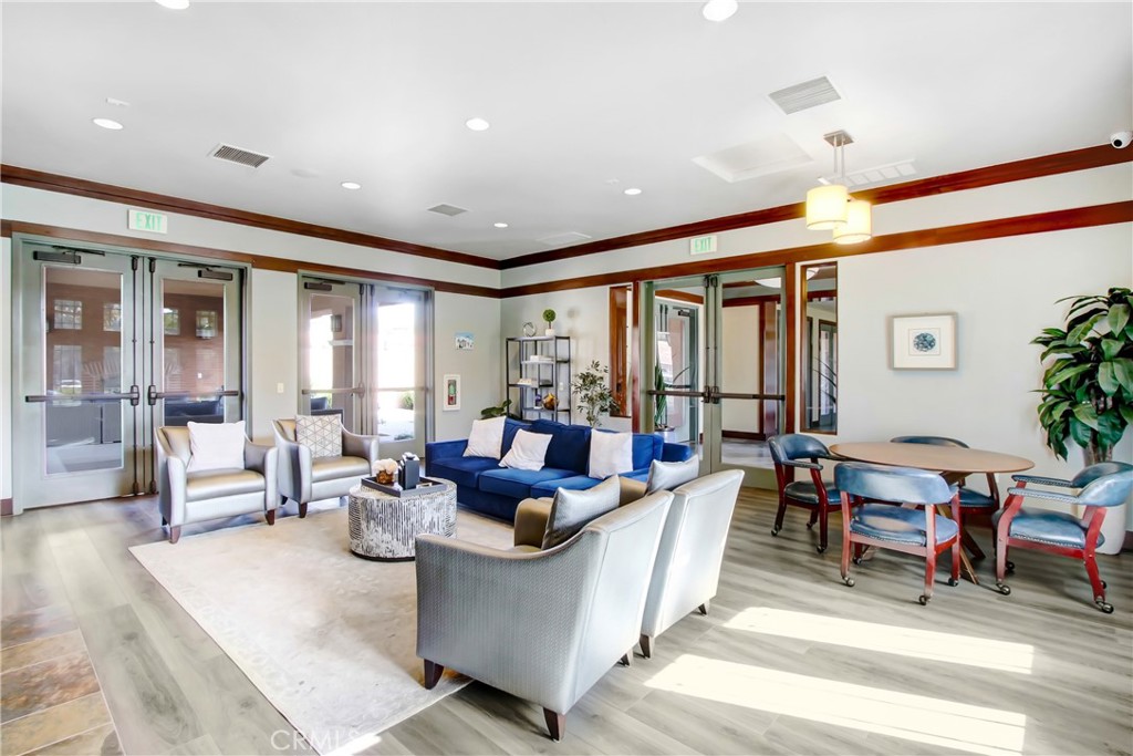 12422 Benton Drive, Unit 1 Rancho Cucamonga, CA 91739 - Photo 19 of 20 a living room with fireplace furniture and a large window