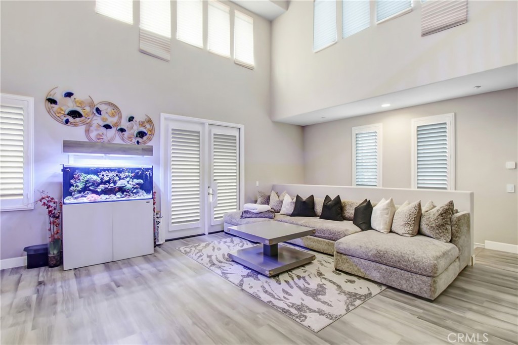 12422 Benton Drive, Unit 1 Rancho Cucamonga, CA 91739 - Photo 4 of 20 a living room with furniture and a window