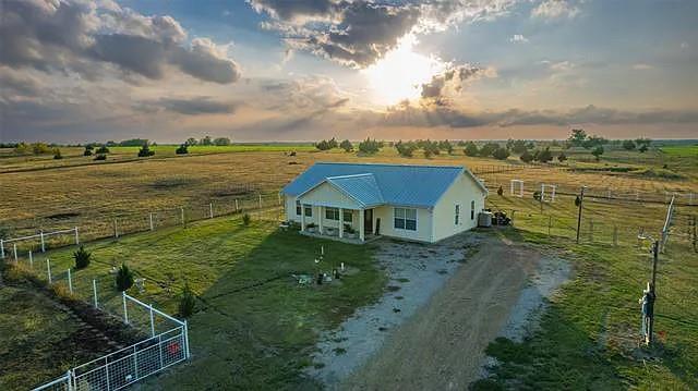 5580 County Road 4506 Commerce, TX 75428 - Photo 1 of 1 aerial view of a house with a lake view