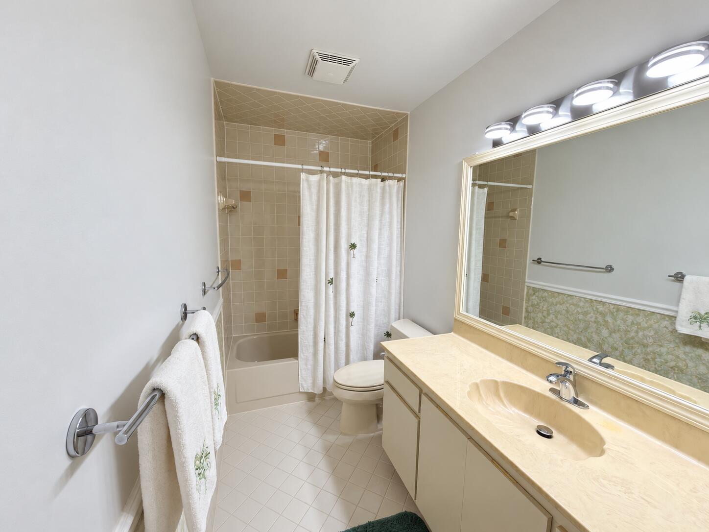 6309 Dusenburg Road Delray Beach, FL 33484 - Photo 15 of 26 Brightened Bathroom in Natural Light