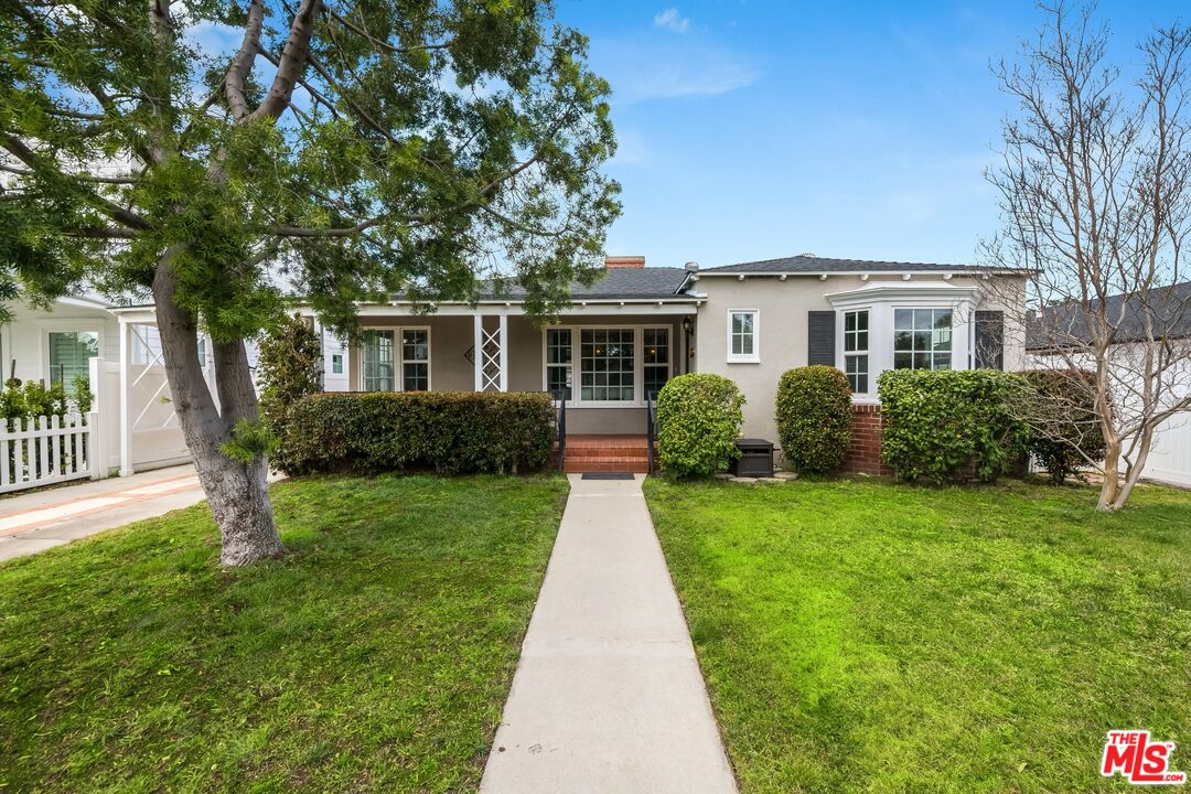 4539 Atoll Avenue Sherman Oaks, CA 91423 - Photo 1 of 28 a front view of house with yard and green space