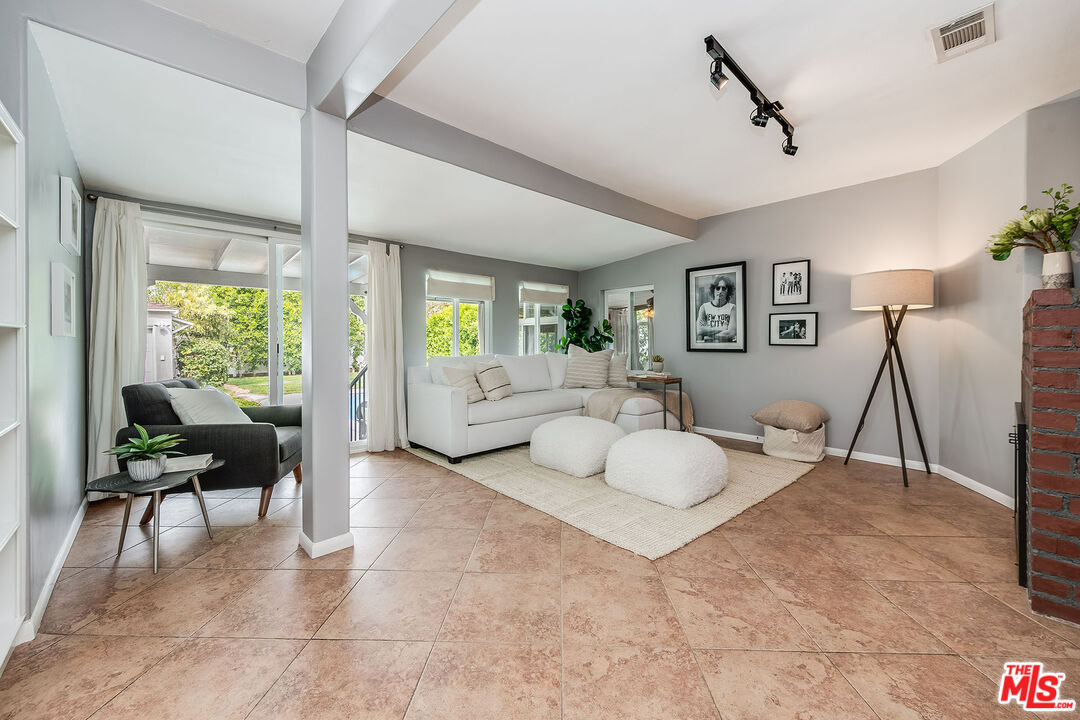 4539 Atoll Avenue Sherman Oaks, CA 91423 - Photo 12 of 28 a living room with furniture and a table
