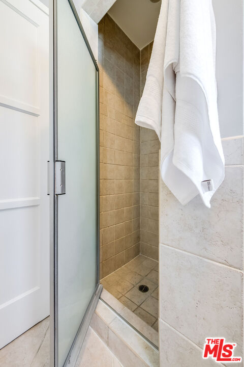 4539 Atoll Avenue Sherman Oaks, CA 91423 - Photo 17 of 28 a bathroom with a shower