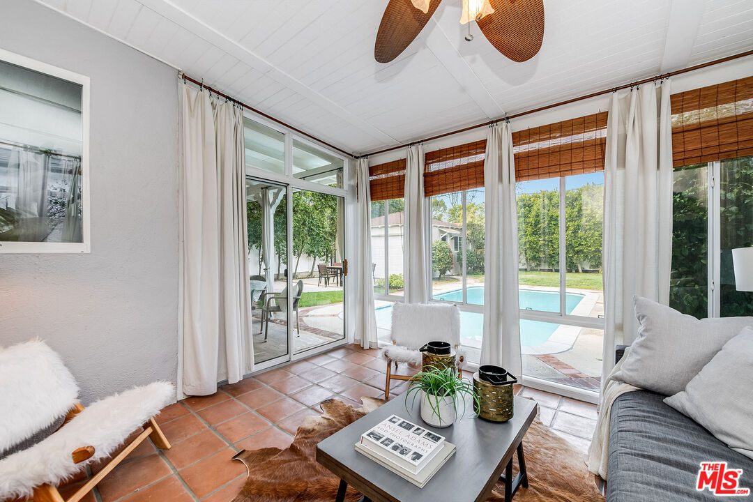 4539 Atoll Avenue Sherman Oaks, CA 91423 - Photo 21 of 28 a living room with furniture and a window